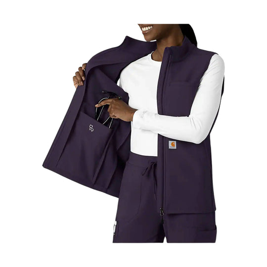Deep purple fleece vest worn open over a white long-sleeve top, with front pockets and a small Carhartt logo patch.