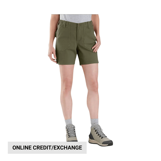 Olive canvas work shorts on a model with front pockets