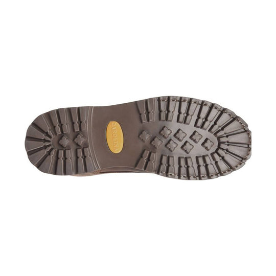 Brown lugged boot outsole with CAROLINA logo plate