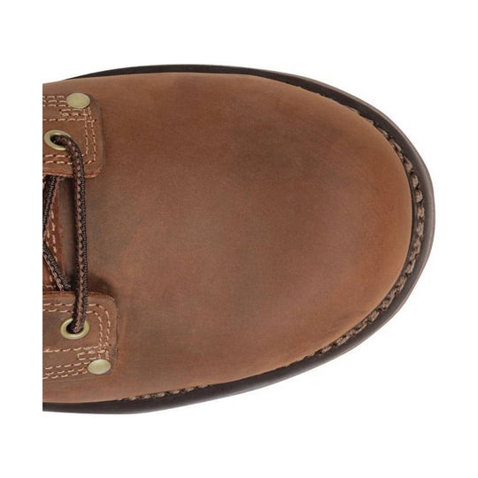 Close-up of a brown leather shoe on a white background