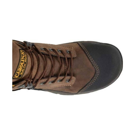 Brown and black boot with Carolina logo on a white background