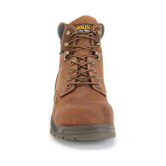 Brown work boot with visible branding on a white background