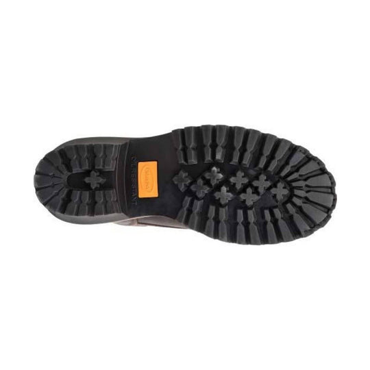 Close-up of a black boot sole with a brand logo on a white background