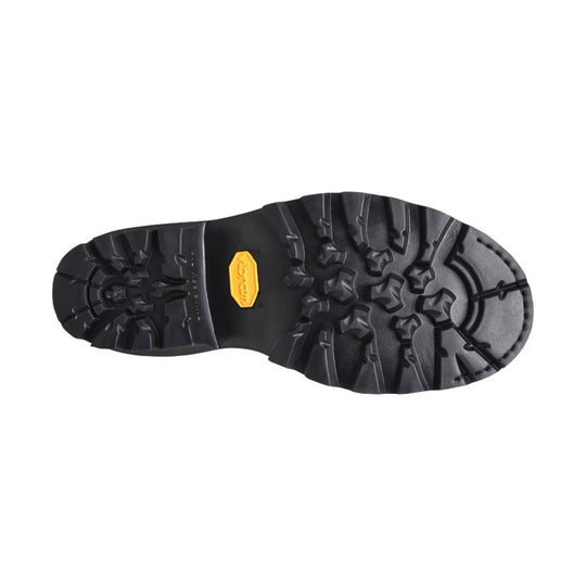 Black lugged work boot outsole with aggressive tread and a yellow brand insert