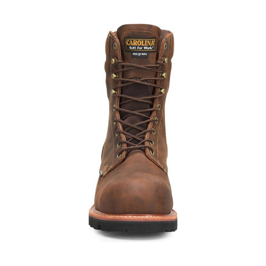 Brown lace-up work boot with metal eyelets and a black lug sole, shown from the front