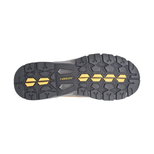 Close-up of a shoe sole with a brand logo on a white background