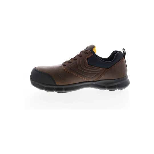 Brown low-top work shoe with black toe cap and sole, mesh collar, and yellow heel tab