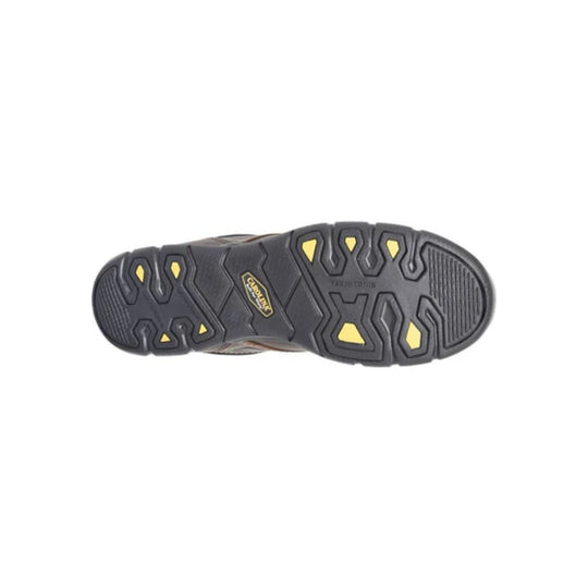 Black work boot sole with yellow traction inserts and visible Carolina logo