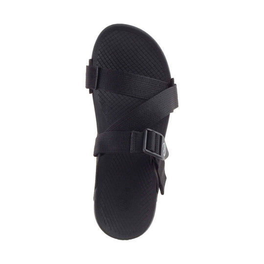 Black strappy slide sandal with an adjustable ankle buckle and textured footbed