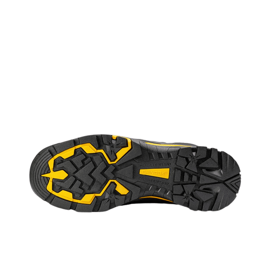 Black rugged boot outsole with yellow traction accents and CHINOOK marking