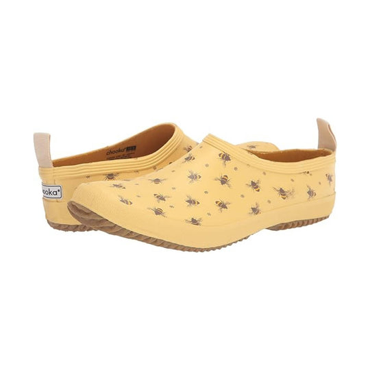 Pair of yellow clogs with bee pattern on a white background
