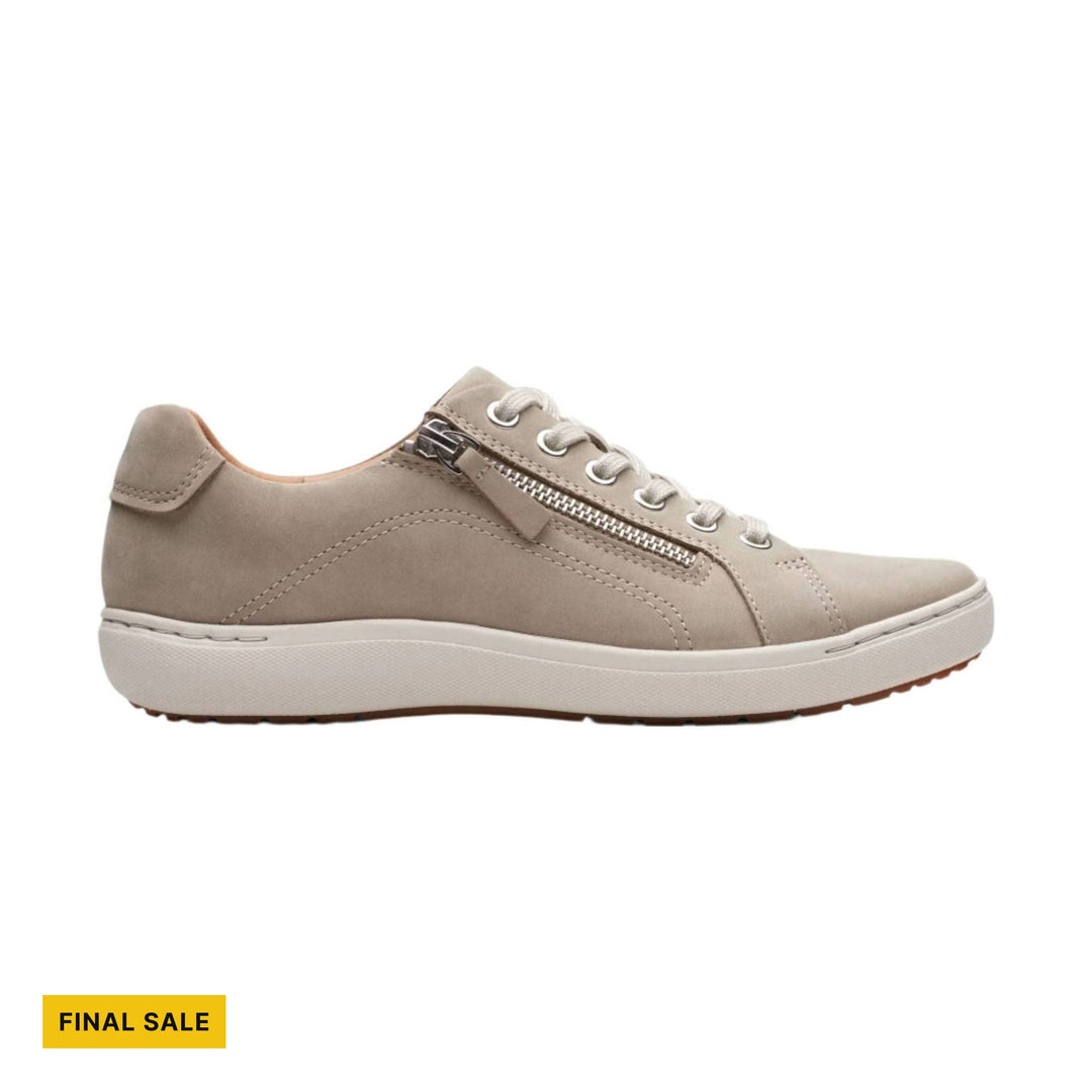 Beige lace-up sneaker with side zipper, white sole, and final sale label