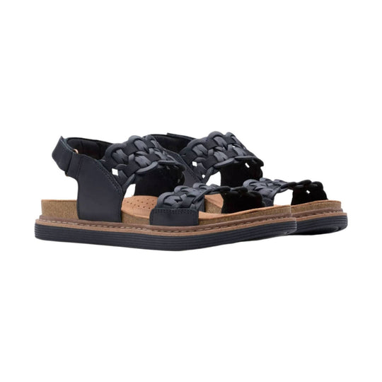 Black braided-strap sandal with a tan footbed and thick black sole