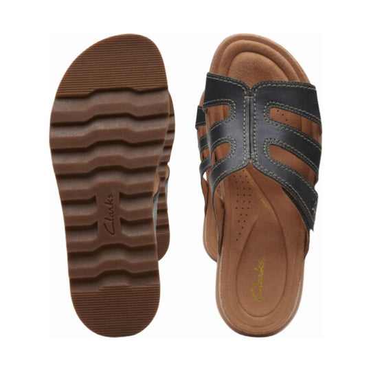 Black and tan leather sandal with side cutouts and thick brown ridged sole, shown top and bottom