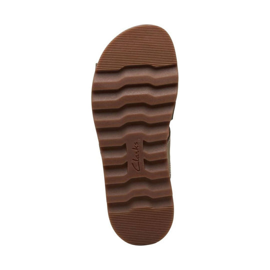 Brown rubber sandal sole with grooved tread and Clarks logo