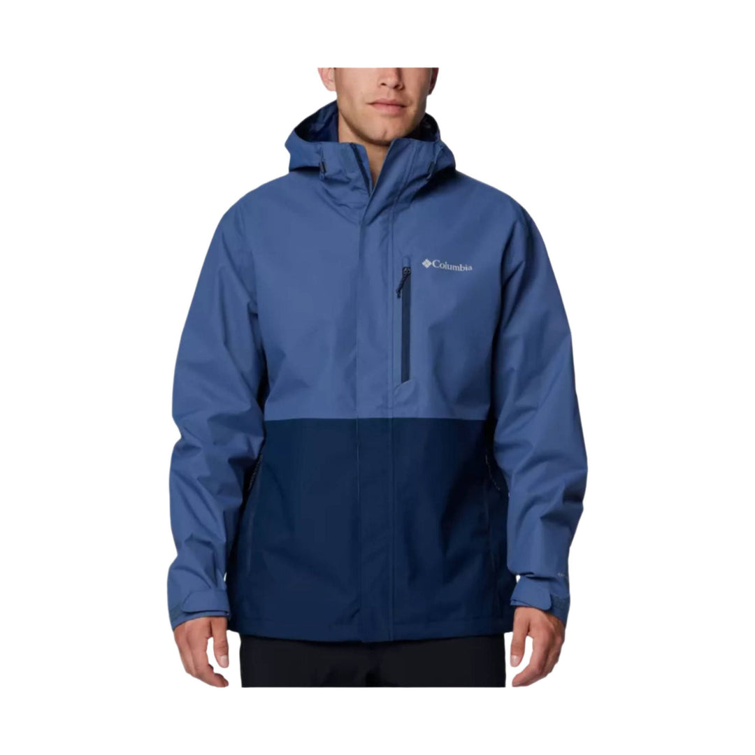 Blue hooded rain jacket with front zipper, chest logo, and vertical chest pocket