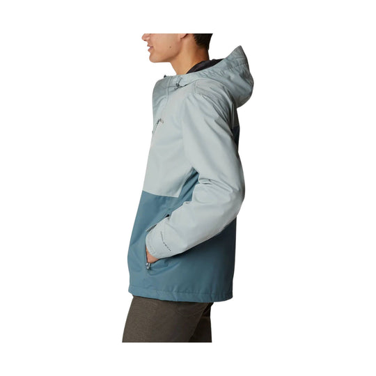 Two-tone hooded rain jacket with zip pockets, side view