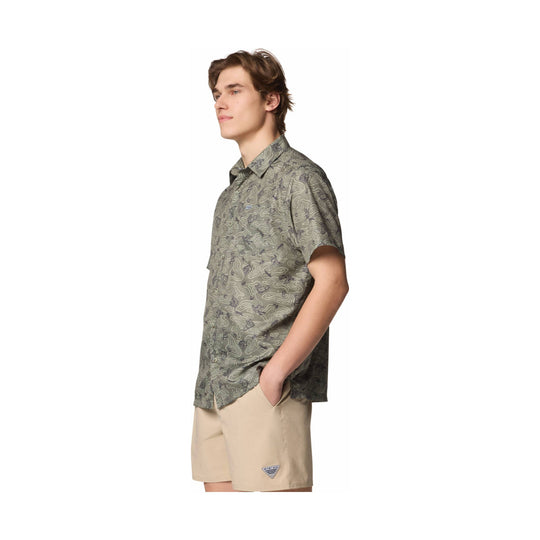 Short-sleeve patterned camp shirt in muted green-gray, shown with tan shorts in side profile