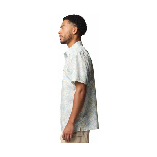 Short-sleeve patterned camp shirt in a light blue and cream print, shown in side profile