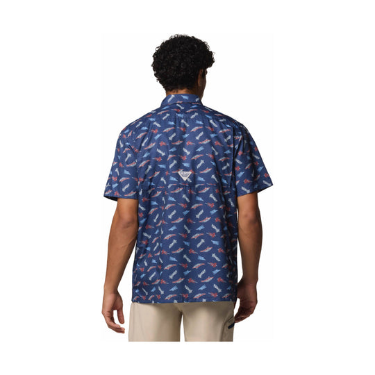 Back view of a navy short-sleeve camp shirt with an allover red, white, and blue print