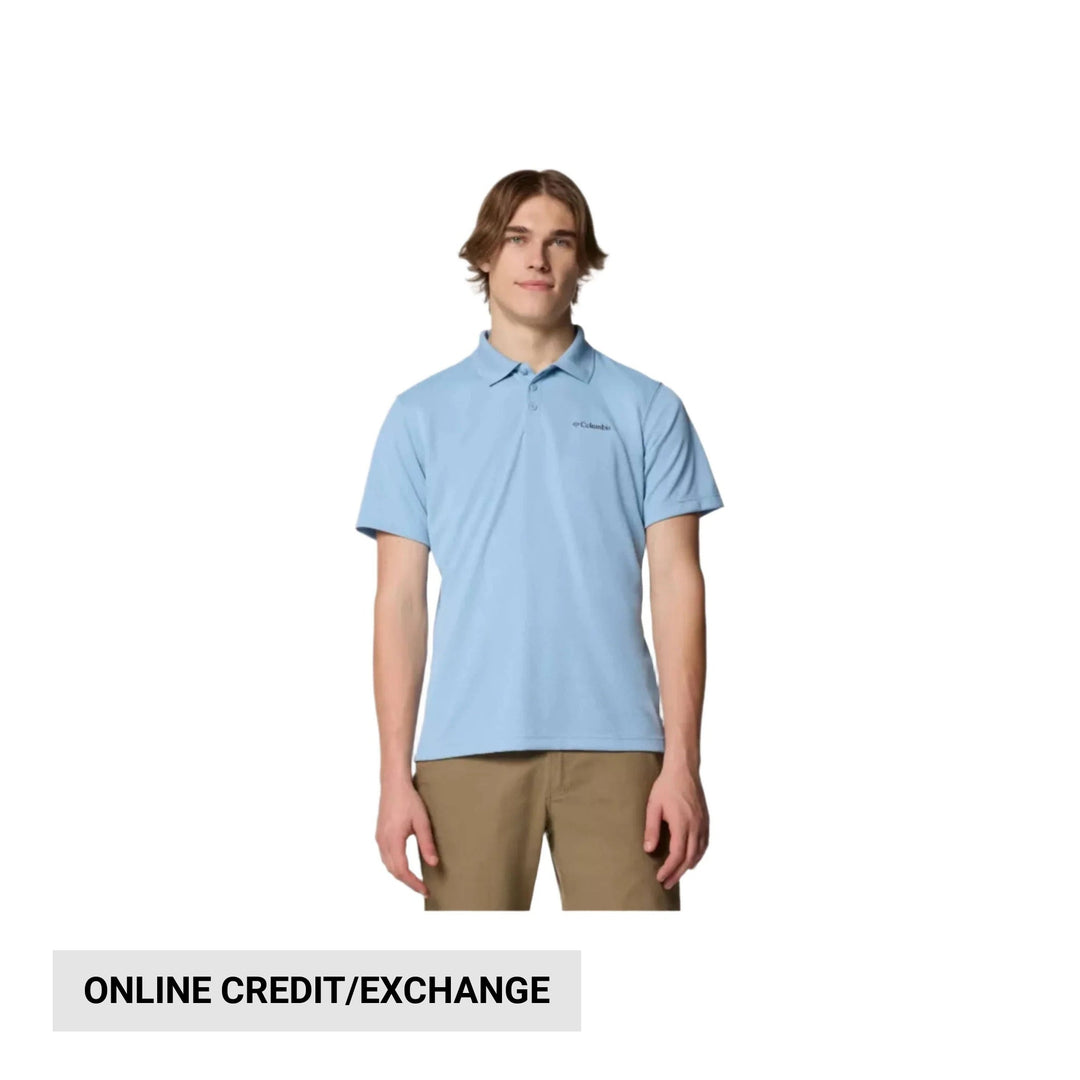 Light blue short-sleeve polo shirt with a small chest logo, worn with tan pants