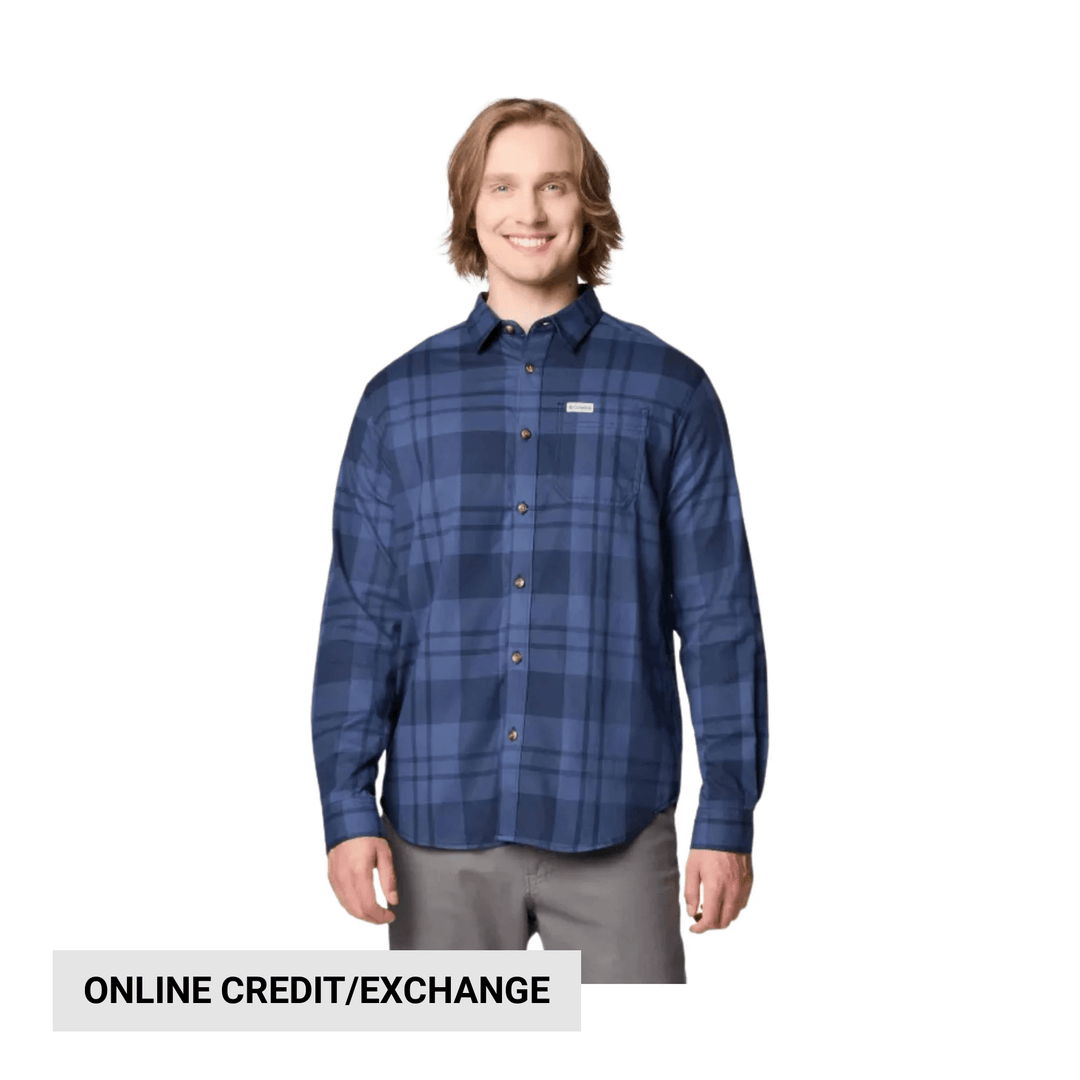 Blue plaid long-sleeve button-up shirt on a model with a small chest logo patch