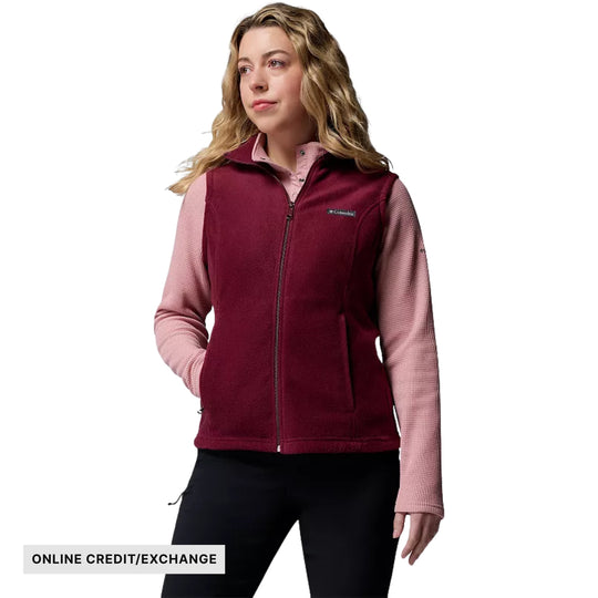 Burgundy fleece vest over a light pink long-sleeve shirt with online credit/exchange label