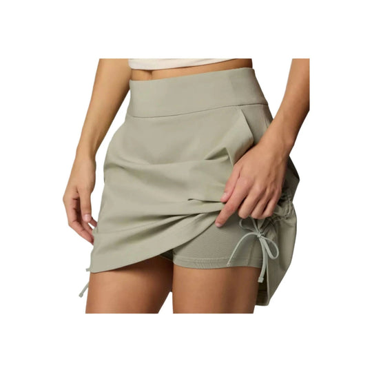 Light sage ruched athletic skort with built-in shorts and side drawstring detail