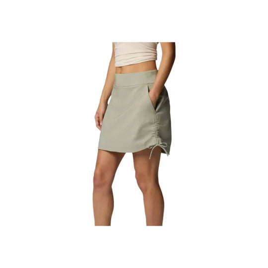 Light sage ruched skort with side drawstring and front pockets, shown on a model