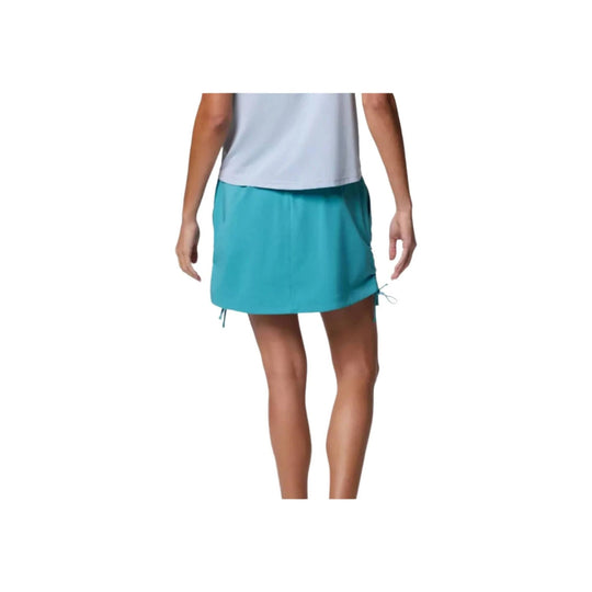 Teal athletic skort with side drawstrings, shown on a model