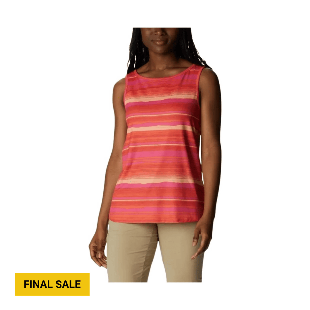 Sleeveless pink and orange striped tank top on a model with tan pants