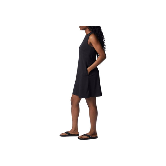 Black sleeveless athletic dress with side pockets, shown in side view