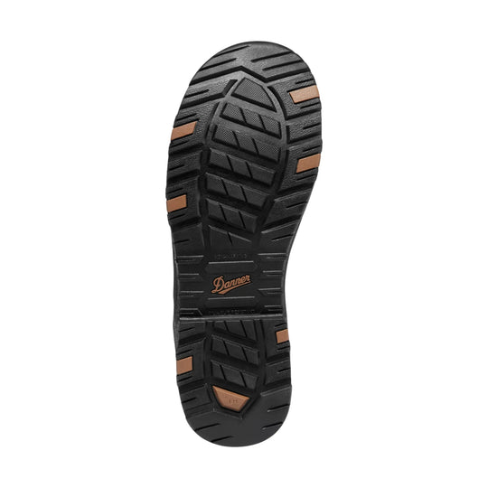 Black treaded boot outsole with brown rubber traction inserts and Danner branding