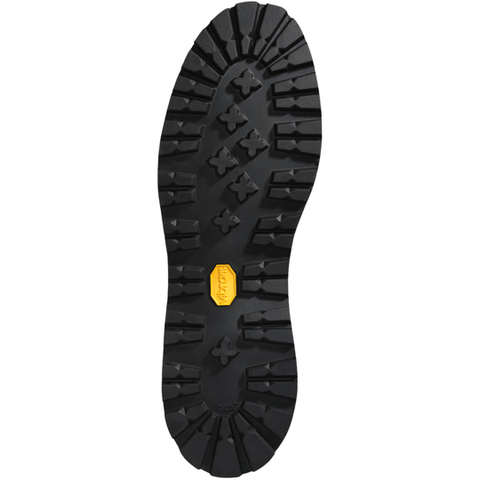 Black lugged boot outsole with a yellow Vibram badge