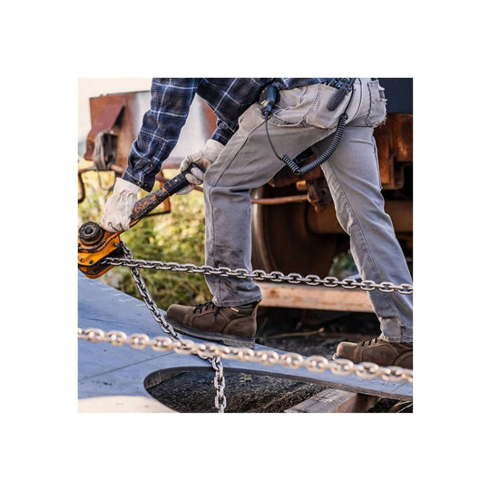 Brown lace-up work boot with a thick sole and metal toe in use on a chain hoist platform