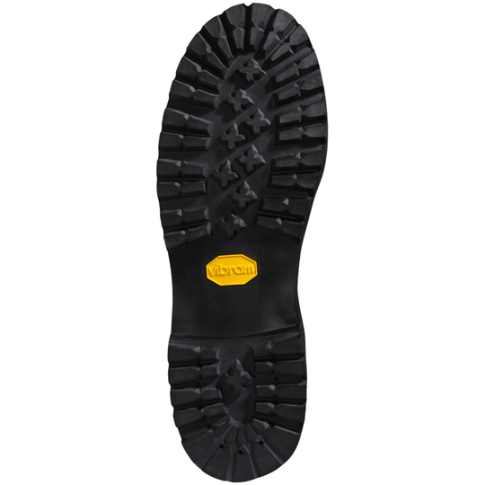 Black lugged boot sole with yellow Vibram logo
