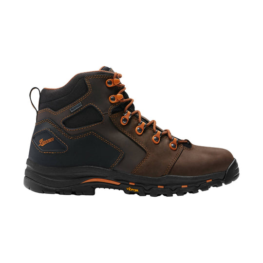 Brown and black lace-up hiking boot with orange eyelets and Vibram sole, side view