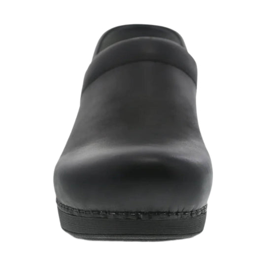 Black closed-back clog with a smooth molded upper and treaded sole, shown from the rear