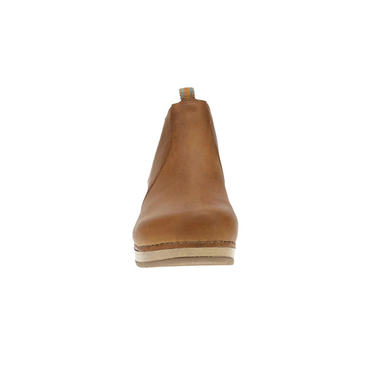 Tan ankle boot with a pull tab and stitched rubber sole, shown from the front