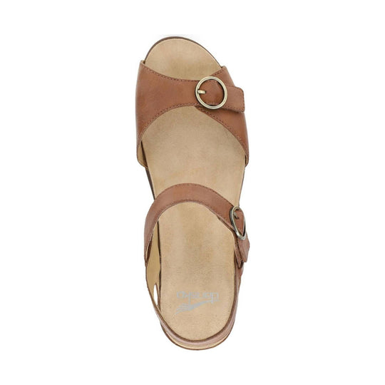 Tan leather sandal with two wide straps, side buckles, and a cushioned footbed, shown from above