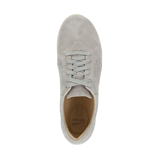 Light gray suede sneaker viewed from above with cream laces and perforated side panels
