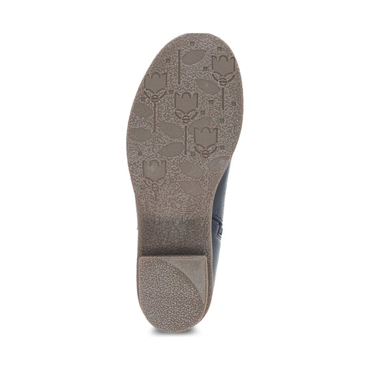 Black boot sole with floral tread pattern and low heel