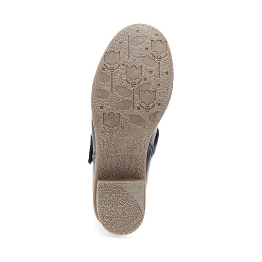 Tan textured boot sole with Dansko logo and size 38 marking