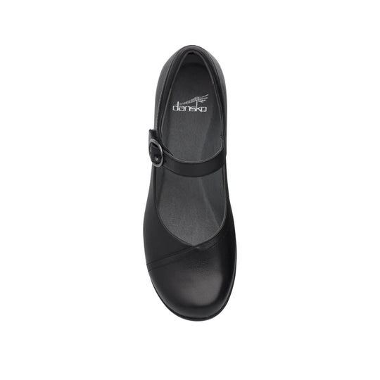 Black Mary Jane flat shoe with a strap and buckle, seen from above
