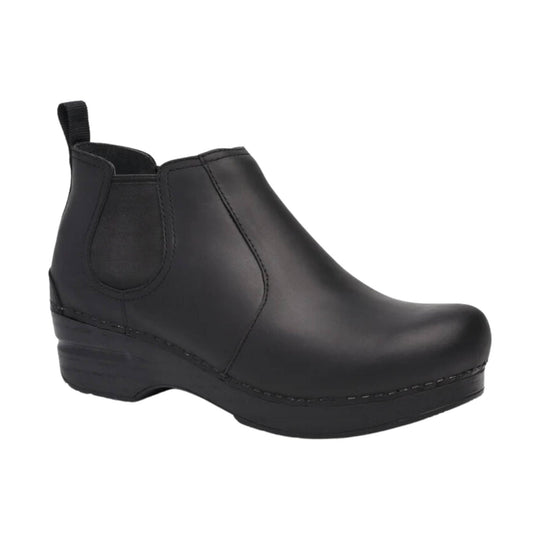 Black ankle boot with elastic side panel, pull tab, and wedge sole