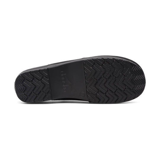 Black boot outsole with zigzag tread and embossed Dansko logo