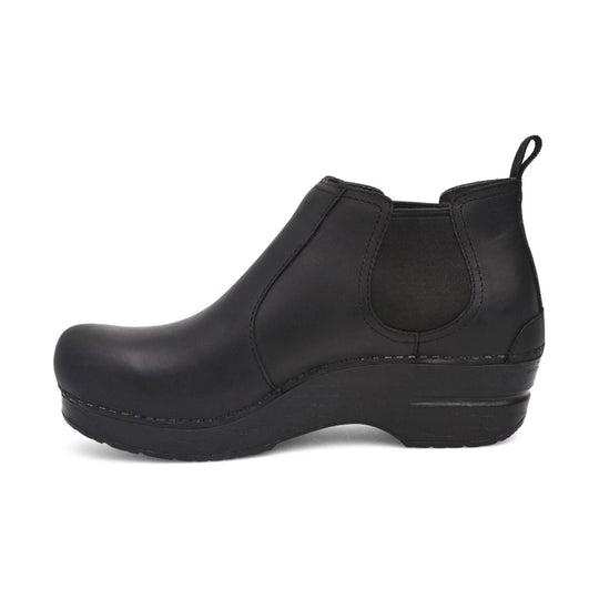 Black Chelsea-style ankle boot with elastic side panels, round toe, and back pull tab