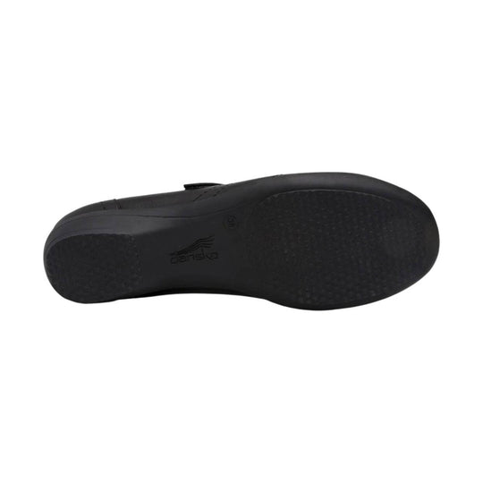 Black shoe outsole with Dansko logo and size 38 marking