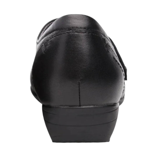 Rear view of a black leather slip-on shoe with a rounded heel and stacked sole