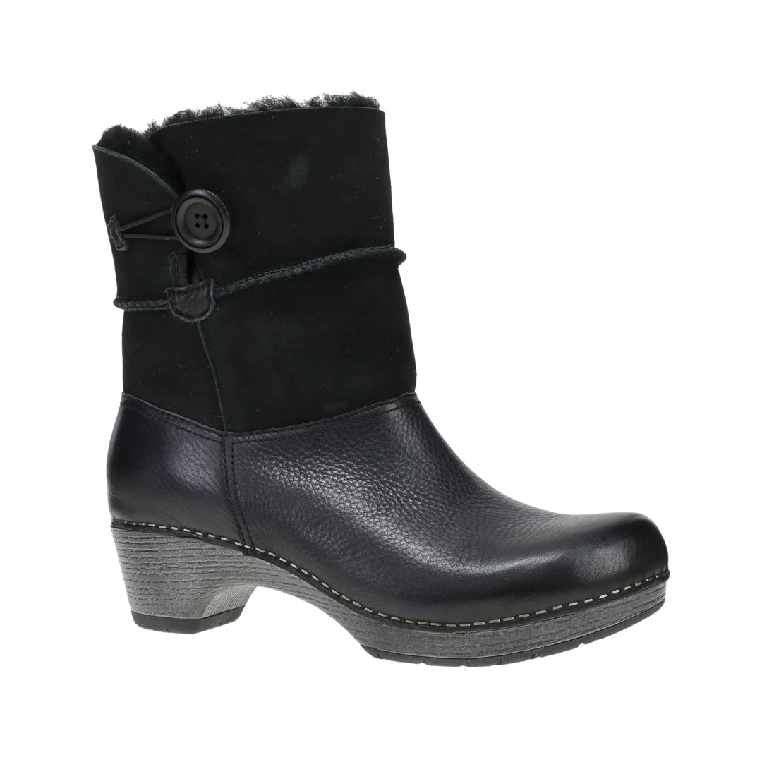 Black ankle boot with suede shaft, leather foot, side button detail, and gray wedge heel